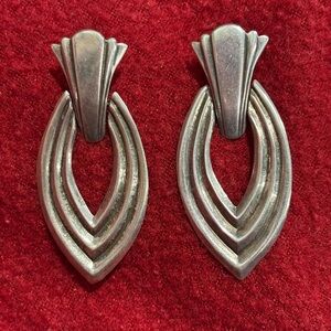 Vintage silver earrings. Stamped 925. Beautiful detailing and not too heavy!